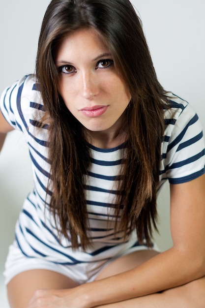 Free photo young pretty female posing at camera