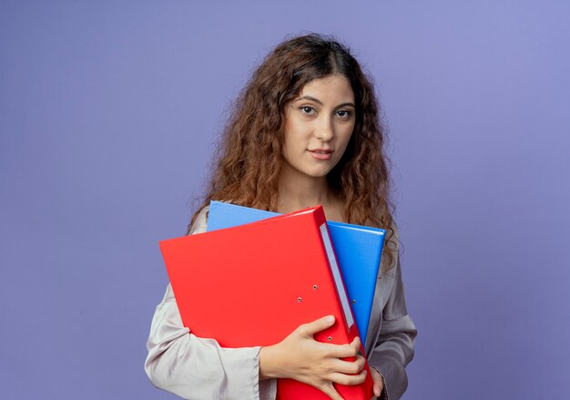 young pretty girl holding folders 