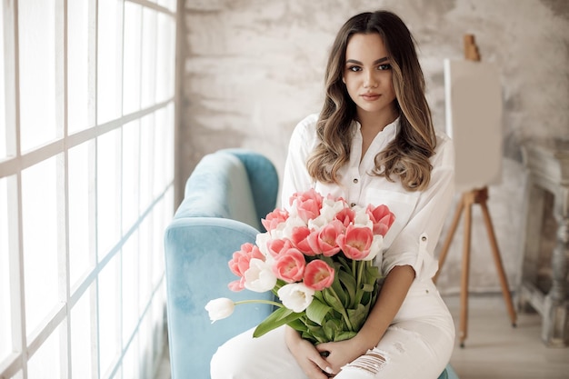 young pretty woman with flowers