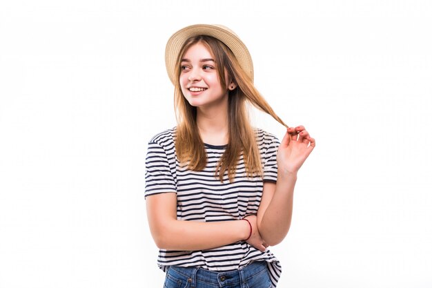 Young pretty woman with straw isolated on white wall