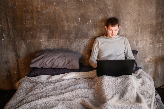 Young professional man working from home