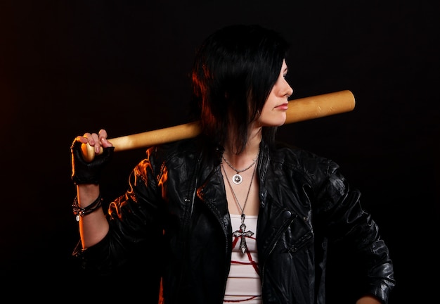 Free photo young punk girl with baseball bat