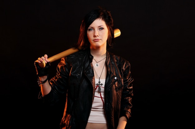 Free photo young punk girl with baseball bat