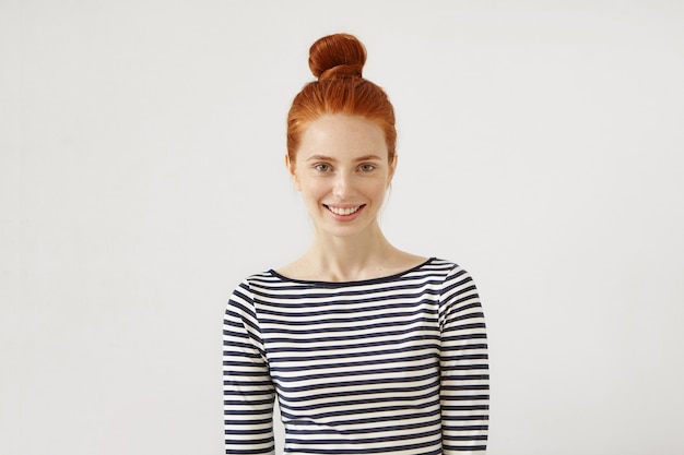 Young redhead woman posing