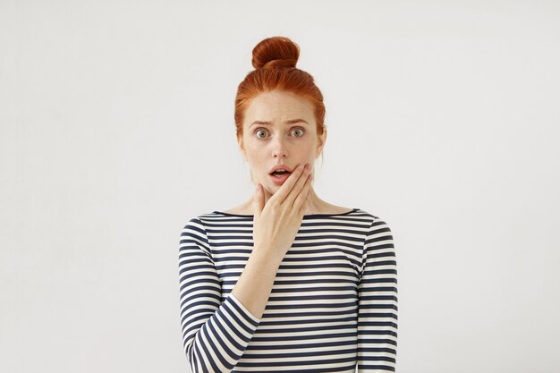 Young redhead woman posing