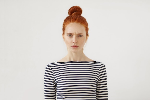 Free photo young redhead woman posing