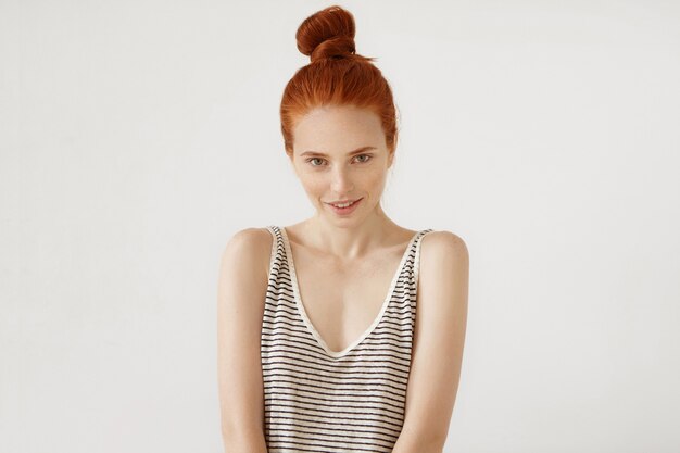 Young redhead woman posing