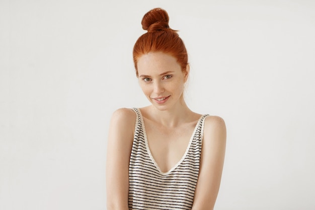 Free photo young redhead woman posing