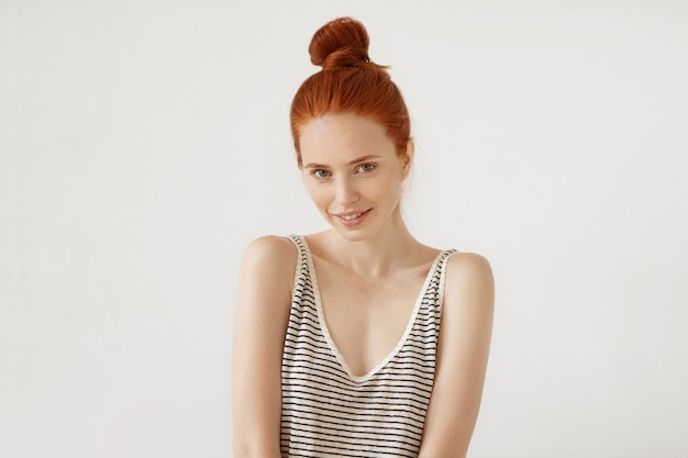 Young redhead woman posing