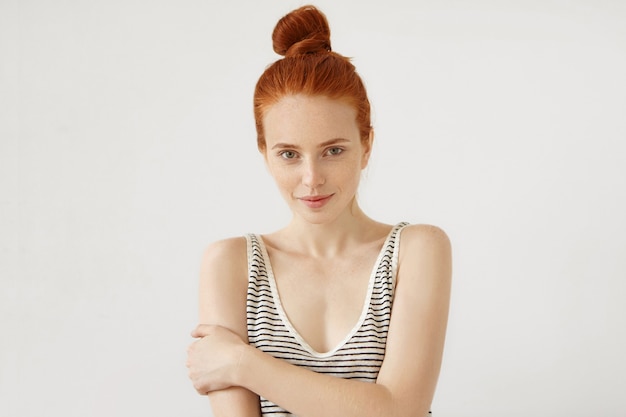 Free photo young redhead woman posing