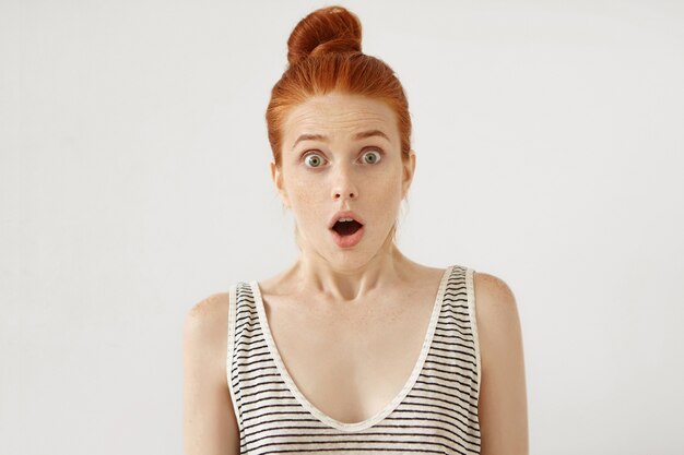 Young redhead woman posing