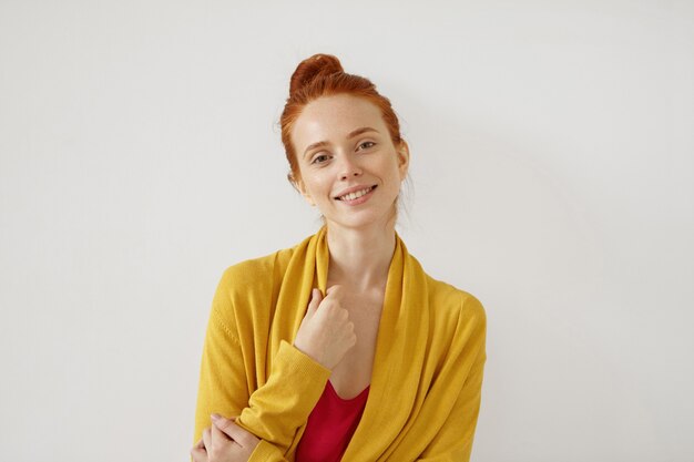 Young redhead woman posing