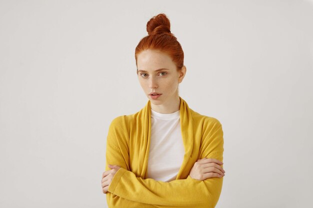 Young redhead woman posing