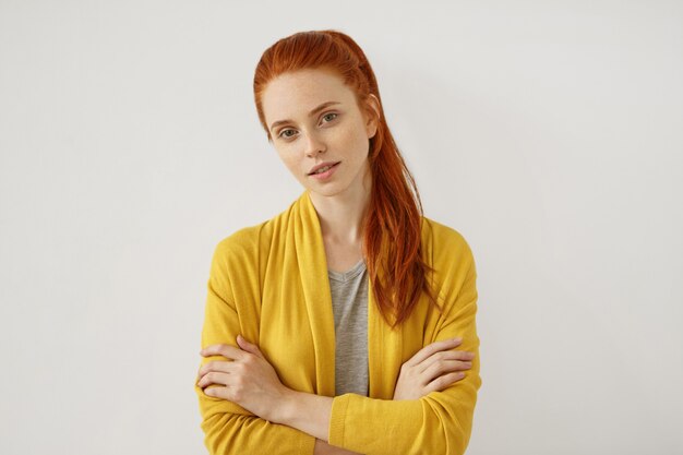 Young redhead woman posing