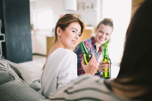 Young relaxing women having beer