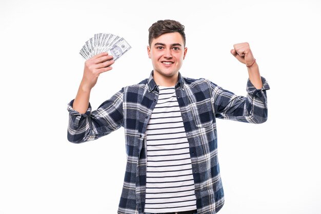 Free photo young rich man in casual t-shirt holding fan of money