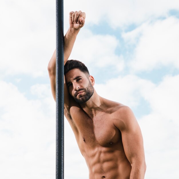 Young runner standing after workout