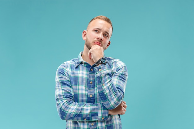 Young serious thoughtful businessman