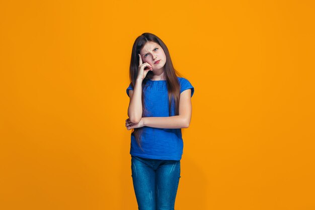 Young serious thoughtful girl