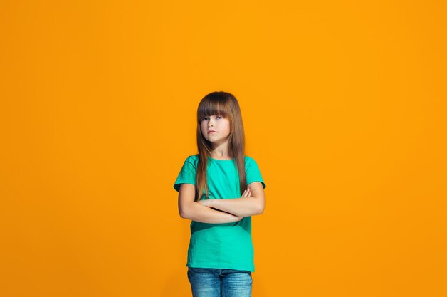 Young serious thoughtful teen girl. Doubt concept.