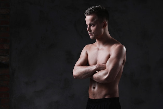 Young shirtless sexy man posing