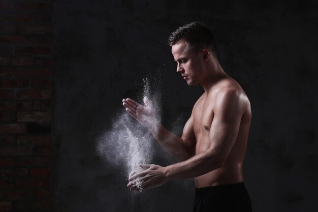 Young shirtless sexy man posing