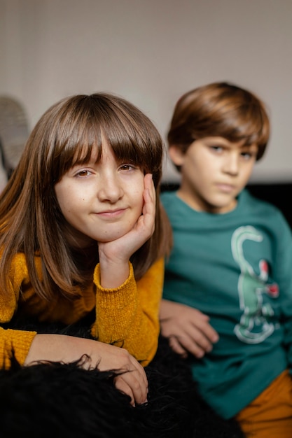 Young siblings at home