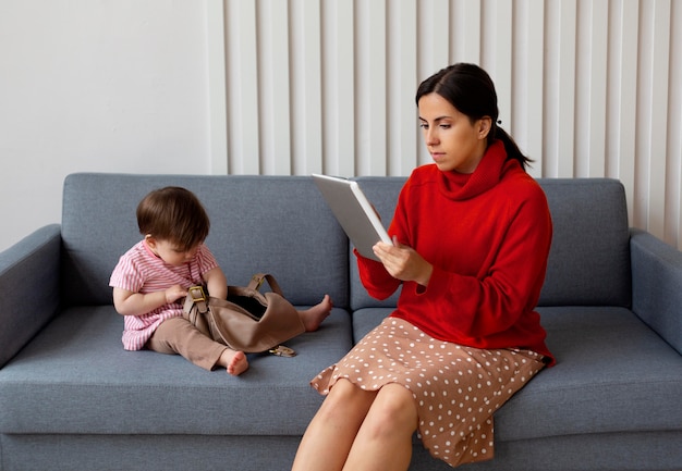 Young single mother spending time with her daughter