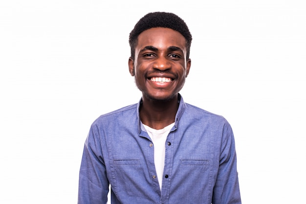 Young smile african man isolated on white wall