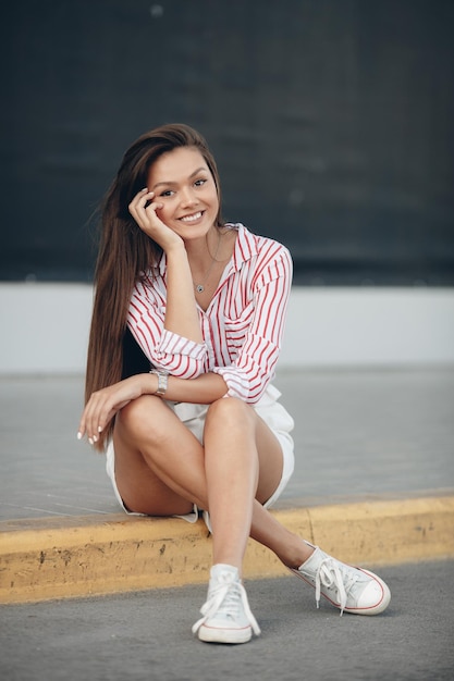 Young smiling woman outdoors