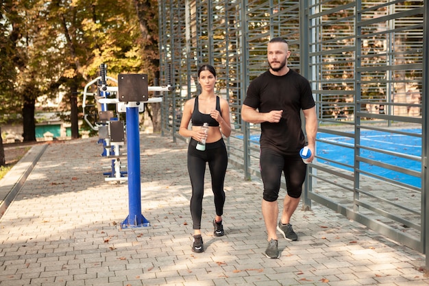 Free photo young sportives walking after training