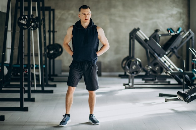 Free photo young sports man training at the gym