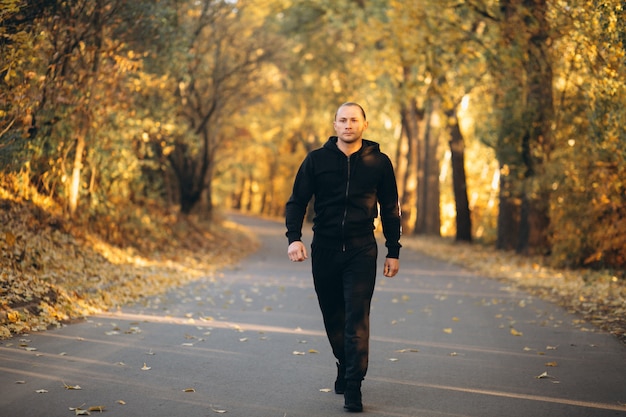 Free photo young sportsman exercising in park