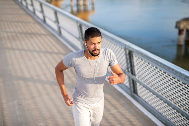 Young sprinter running