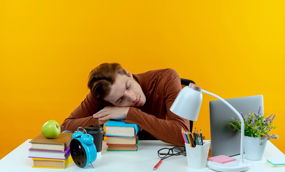 https://img.freepik.com/free-photo/young-student-boy-sitting-desk-with-school-tools-putting-hand-books-sleep-isolated-yellow-wall_141793-78144.jpg?w=996&t=st=1687169712~exp=1687170312~hmac=31747b08cd6eb826f9a256028bf771d1e292e7a051d8b11008f0b40e58bfd740