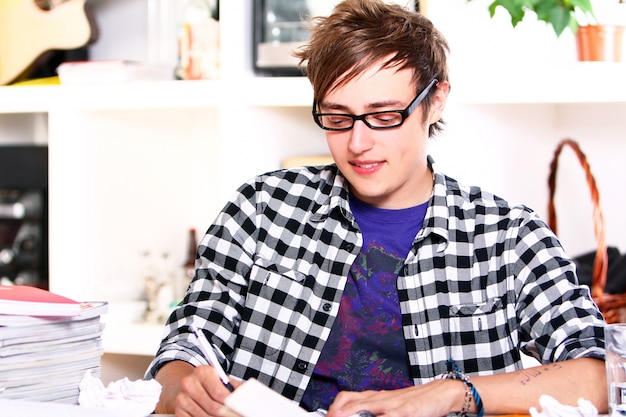 Young student studying at home