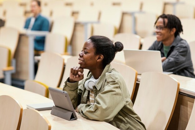 young students attending a university class