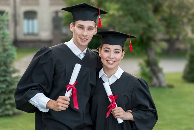 Young students celebrating their graduation