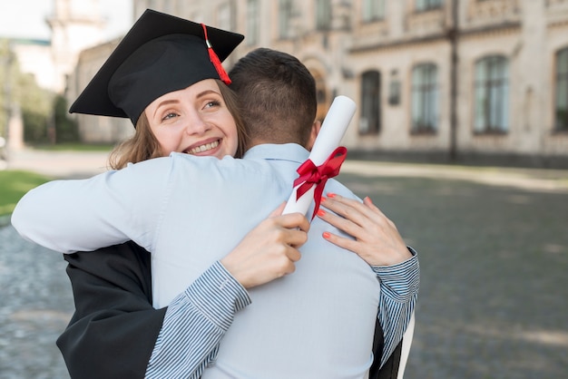 Young students celebrating their graduation