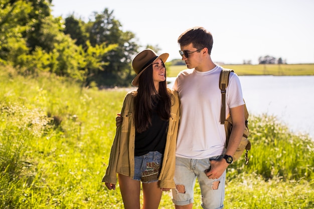 Young stylish couple looking at each other