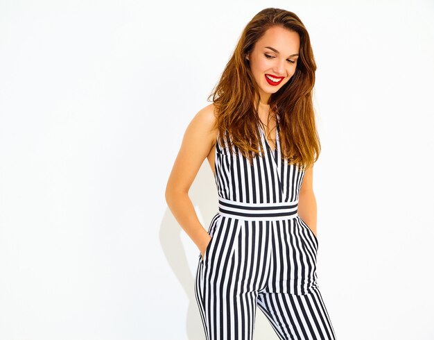 Young stylish smiling woman model in casual summer striped suit with red lips, isolated