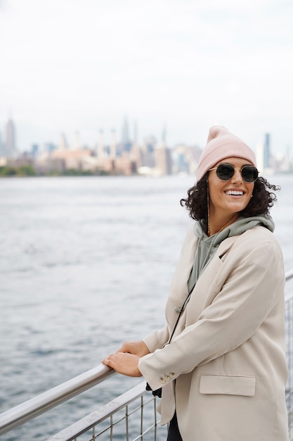 Young stylish woman exploring the city by herself