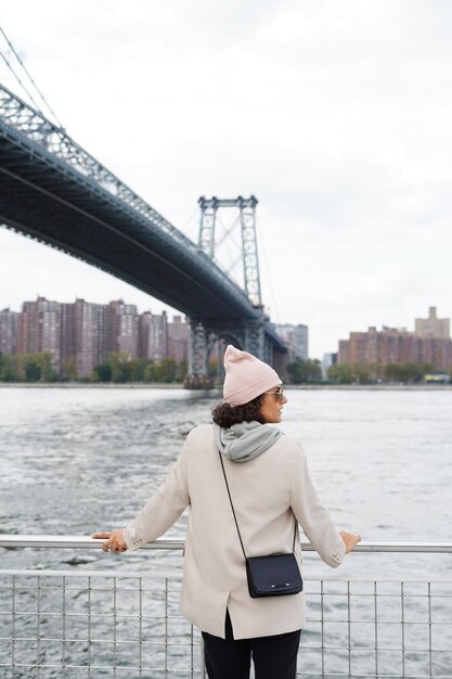 Young stylish woman exploring the city by herself