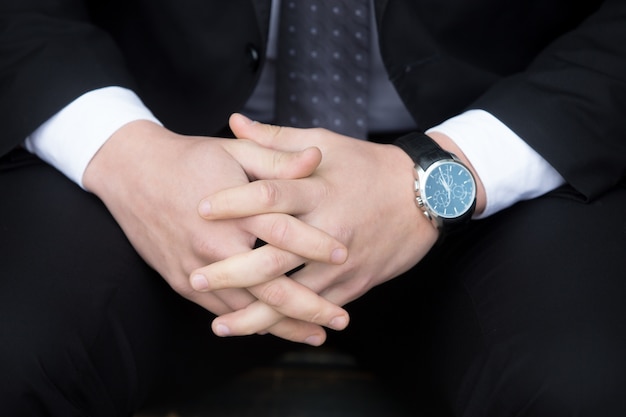 Young successful business man. Hands close-up