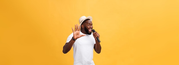 Young teenage black african american boy singer performing at a concert