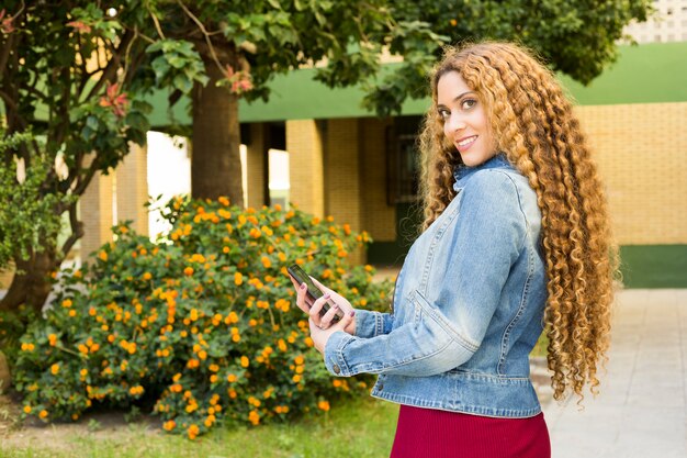 Young urban woman in garden