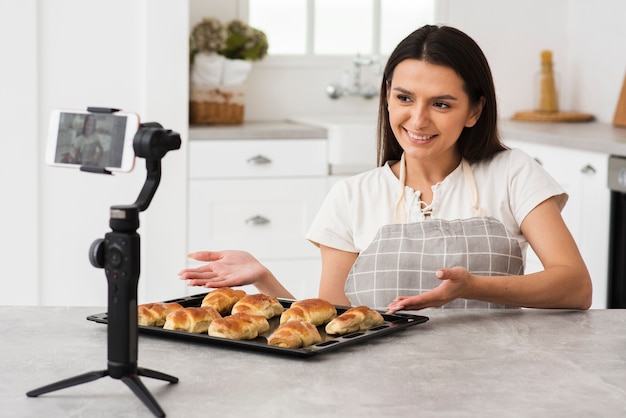 Young vlogger proud of her pastries