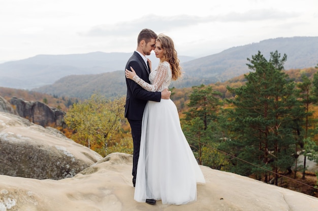 Free photo young wedding couple enjoying romantic moments