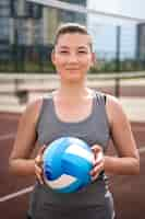 Free photo young woman as volleyball player