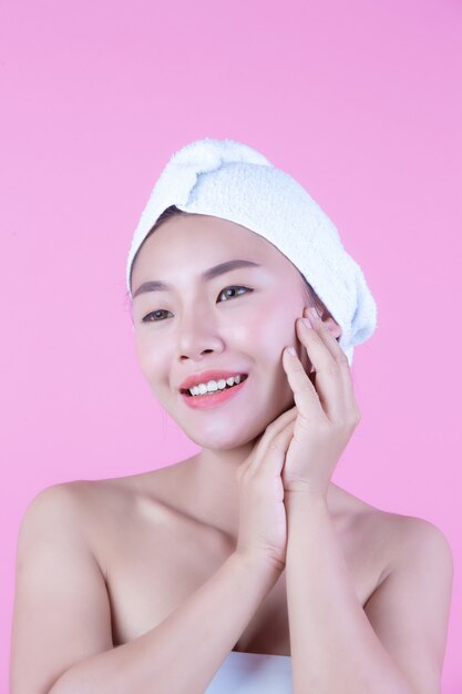 Young woman asia with clean fresh skin touch own face, Expressive facial expressions, Cosmetology and Spa.